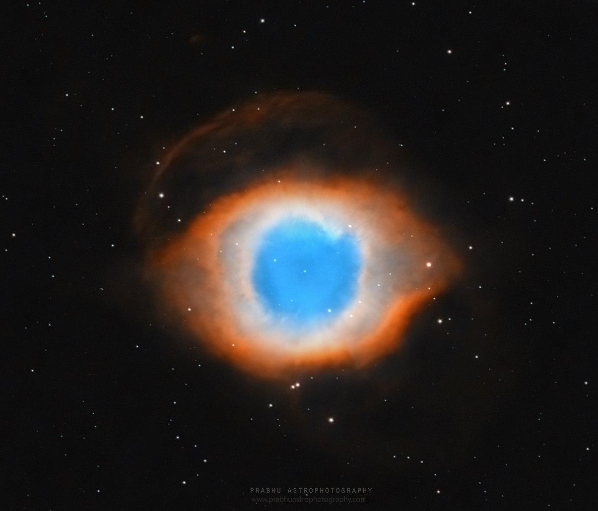 Helix nebula in HOO palette, showing emissions from Hydrogen and Oxygen gas.